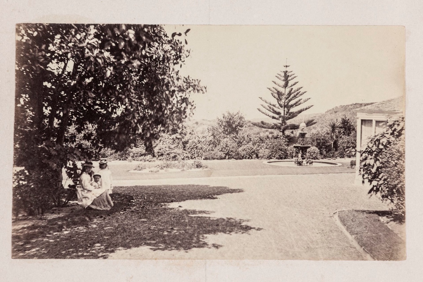 A group of people sitting on a bench AI-generated content may be incorrect.
